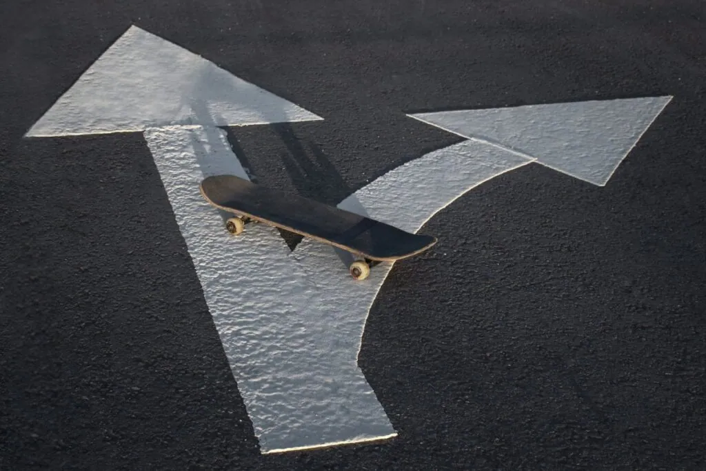 Skateboard on arrowed road decision point