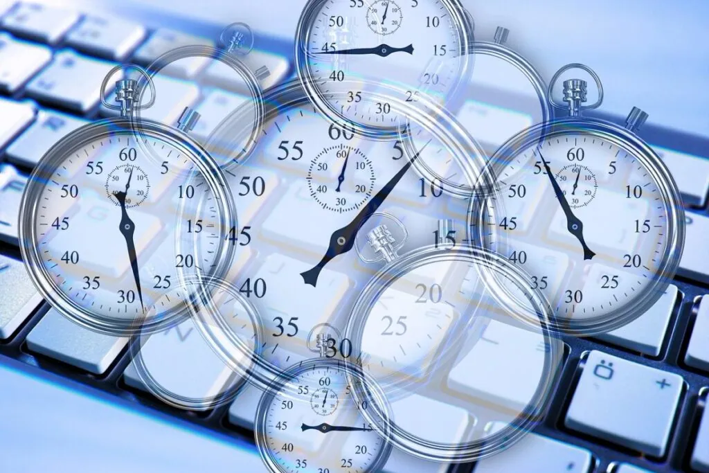 Multiple stopwatches overlayed on a computer keyboard