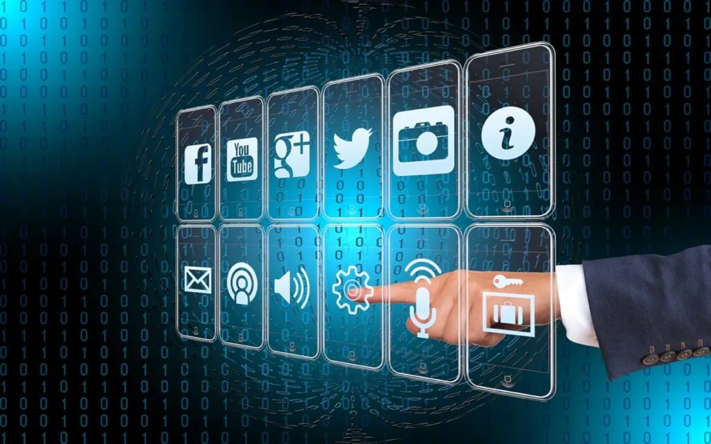 Hand pointing at digital icons on a virtual interface
