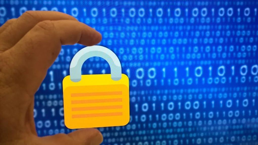 Hand holding a digital padlock with binary code