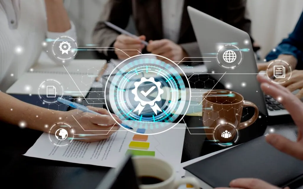 Business team discussing documents with digital icons overlay