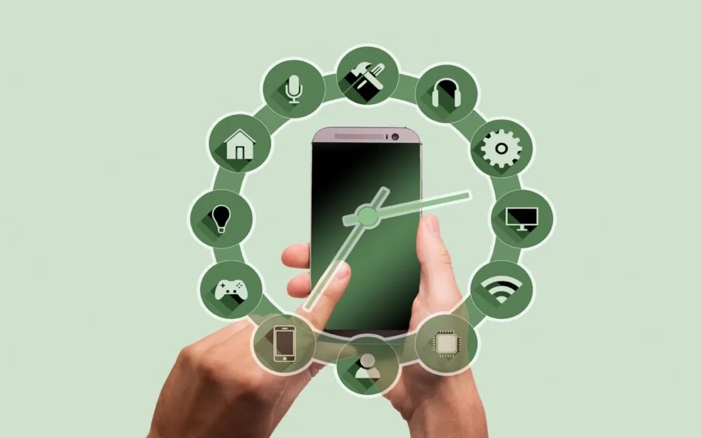 Hands holding a smartphone surrounded by icons