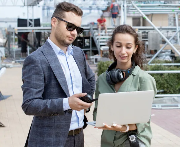 Event planners coordinating on-site setup