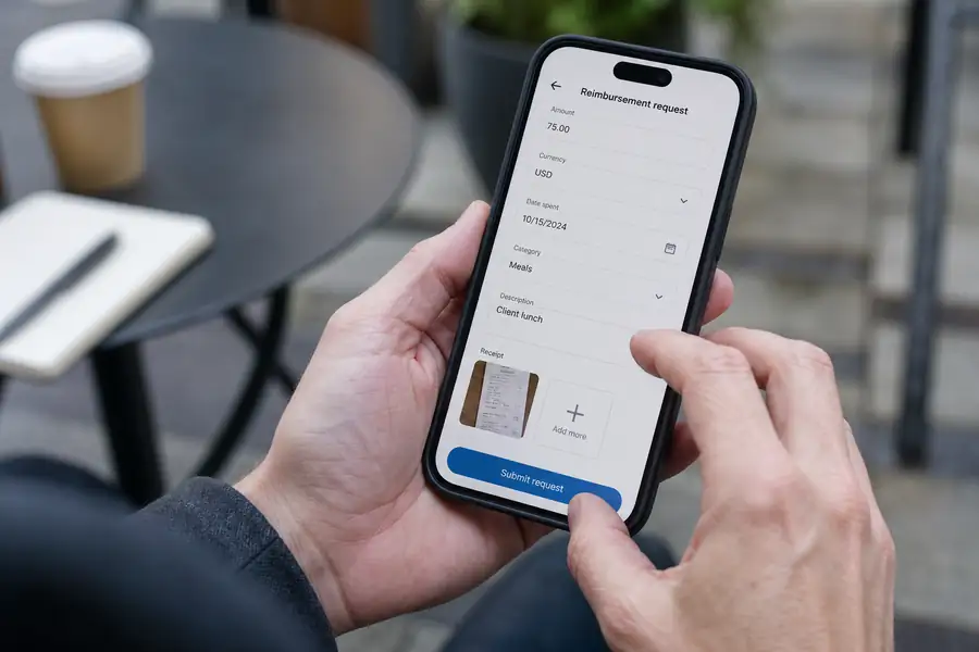 Employee submitting a reimbursement request on a phone app